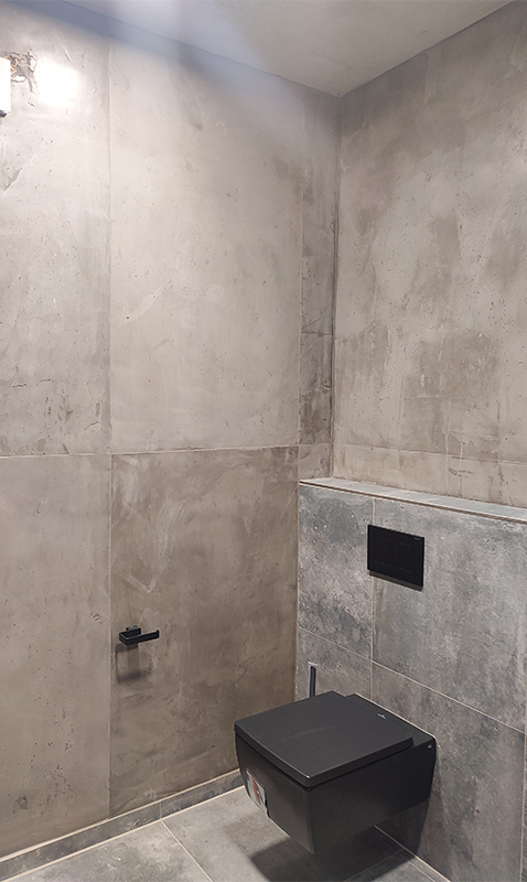 Betonplatten Look im WC - modernes Design in Lohne
